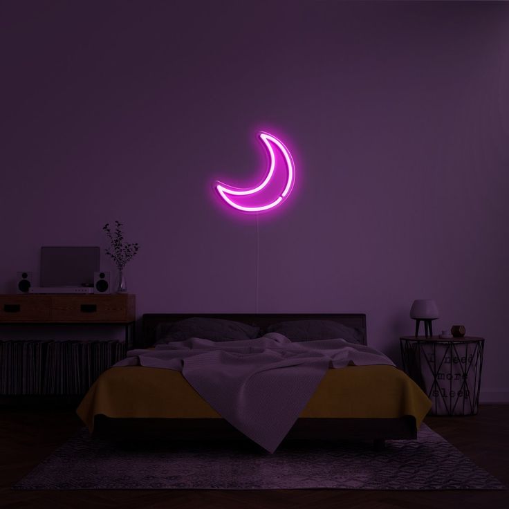 LED Pink Moon Neon Light design in the bedroom wall above the bed